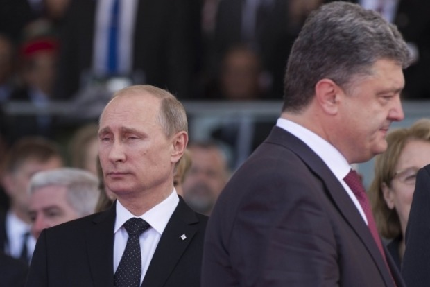 Фейгин: Путин ненавидит Порошенко, но считается с ним