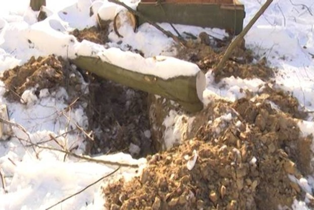 Бандити, які змусили хлопця рити собі могилу під Києвом, виявилися ветеранами АТО