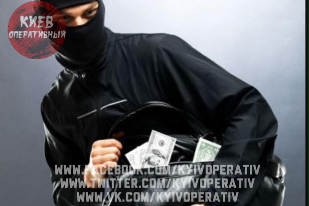 В Киеве вооруженная банда похитила 2,4 млн грн